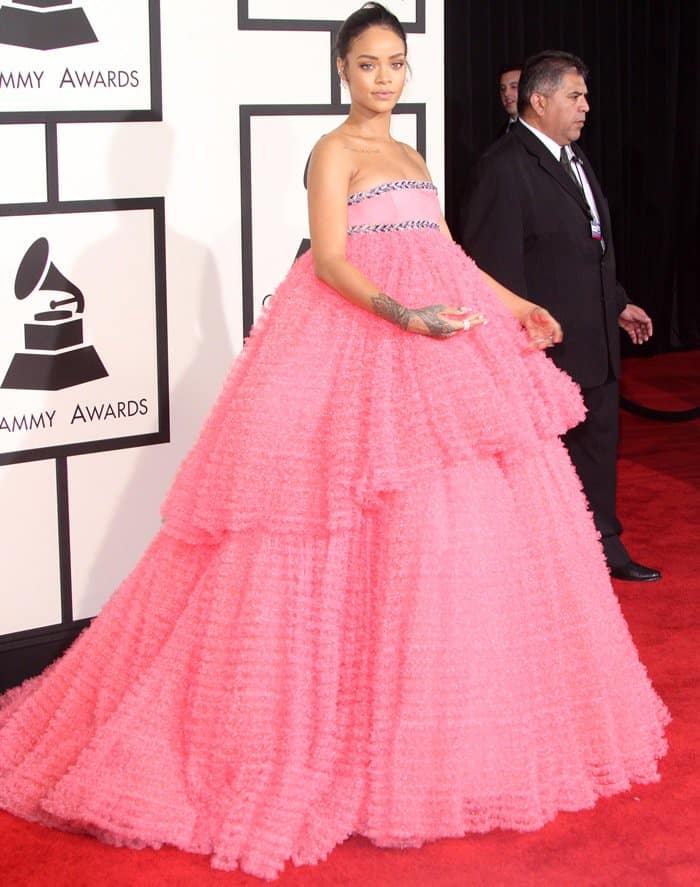 Rihanna makes a bold statement in a strapless, tiered cupcake-pink Giambattista Valli Couture gown at the 2015 Grammy Awards