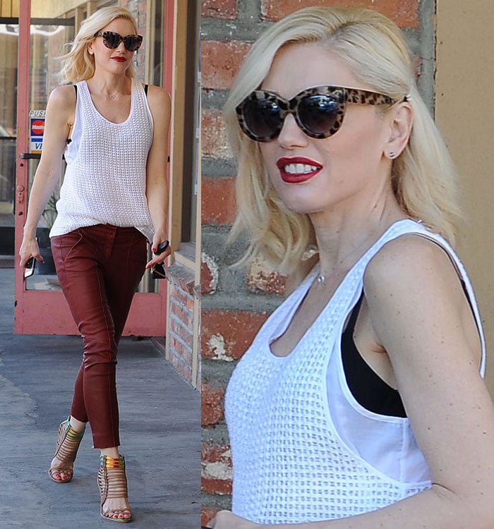 Gwen Stefani with side part haircut wobbling in high heels