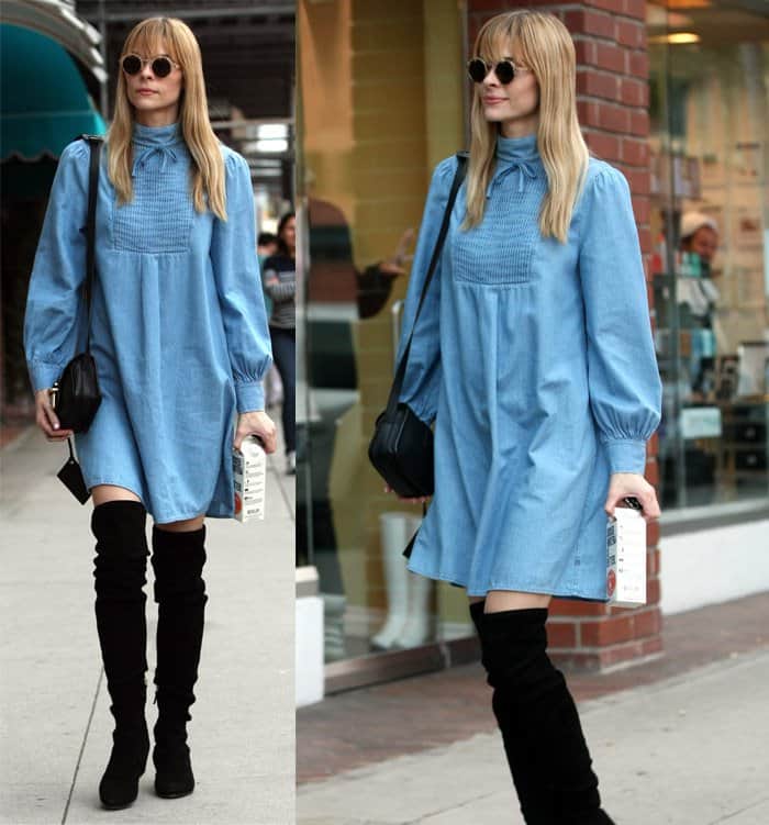 Pregnant Jaime King subtly spotlights her baby bump while grounding her soft chambray shift with sleek black thigh-high boots during a relaxed nail salon outing in Los Angeles on February 21, 2015