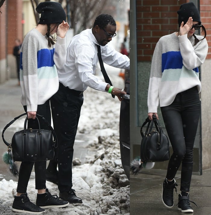 Kendall Jenner paired a Proenza Schouler color-block cashmere sweater with RES Denim Gettin Hi the Shining pants, Puma Modern Court high-tops, a Givenchy Lucrezia bag, and Fendi Karlito and pompom bag charms in snowy New York City on March 3, 2015