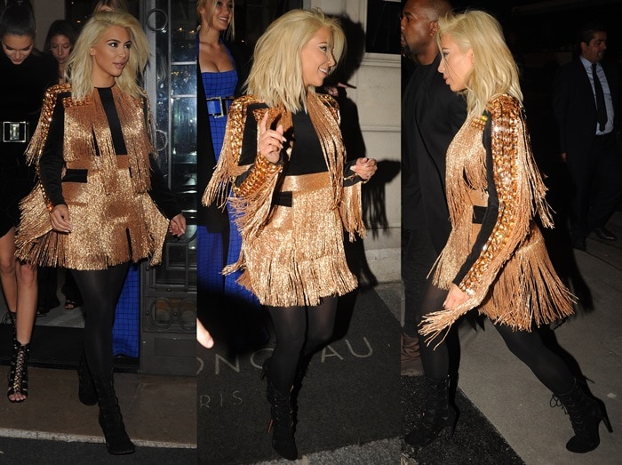 Kim Kardashian channels a glamorous Wild West vibe in a glittering gold-fringed Balmain Pre-Fall 2015 jacket and skirt, paired with black suede lace-up boots by Azzedine Alaïa
