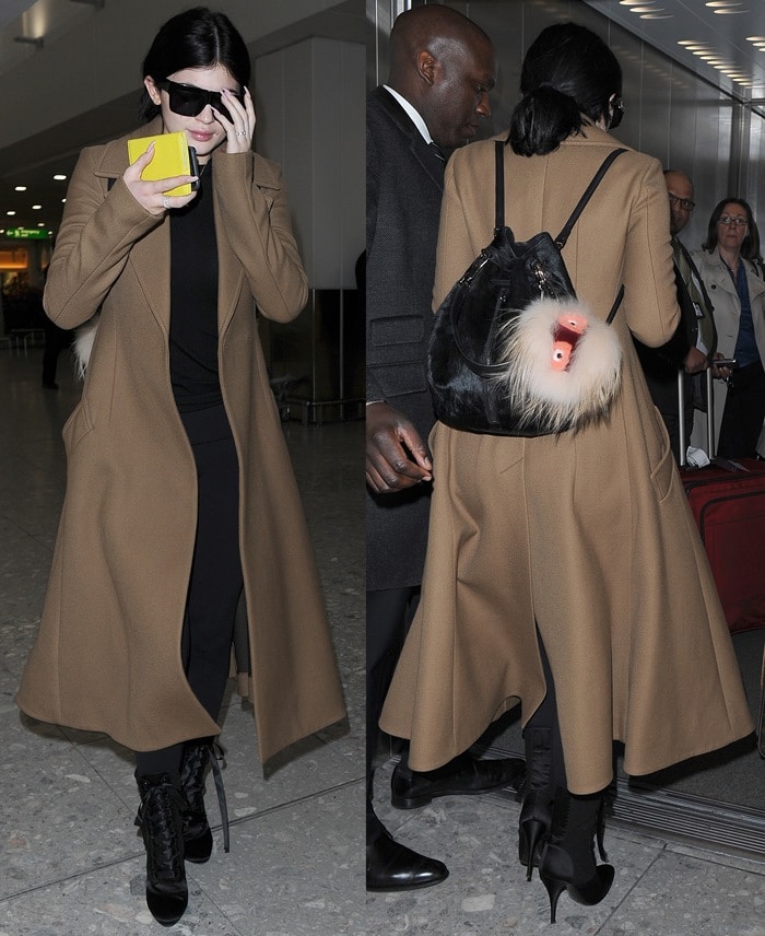 Wrapped in a tailored Max Mara “Manuela” coat and sky-high Giuseppe Zanotti x Balmain “Uma” boots, Kylie blended comfort and quiet luxury for her London arrival on March 13, 2015