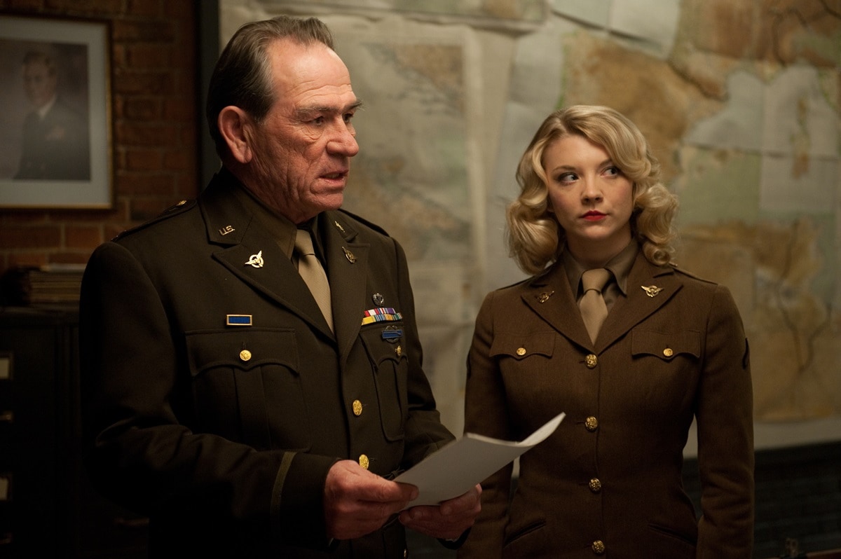 Tommy Lee Jones portrays the authoritative Colonel Chester Phillips, while Natalie Dormer captivates as the alluring Private Lorraine in Captain America: The First Avenger