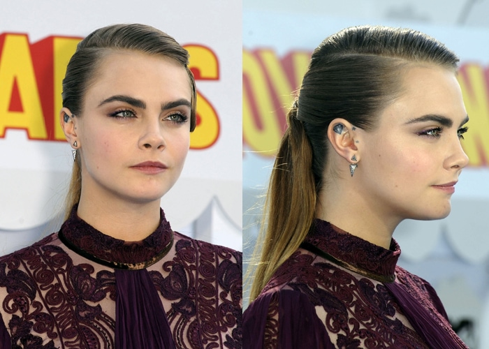 Cara Delevingne's sleek ponytail with finger waves on the side, plum eyes, and rosy pink lips