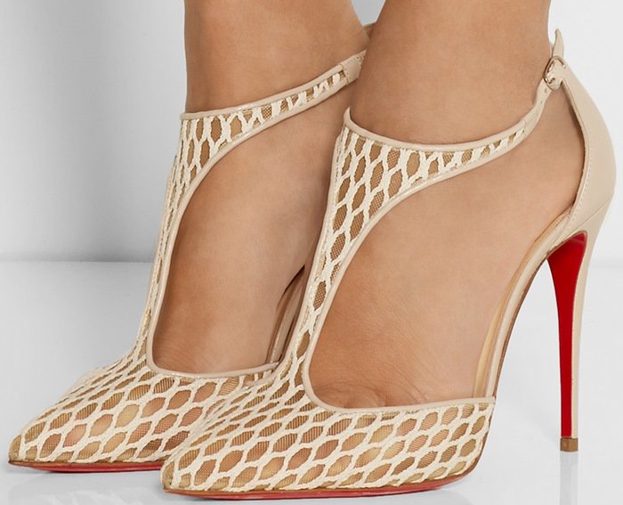 Close-up view of Christian Louboutin Salonu mesh and lace T-strap pumps with pointed toes