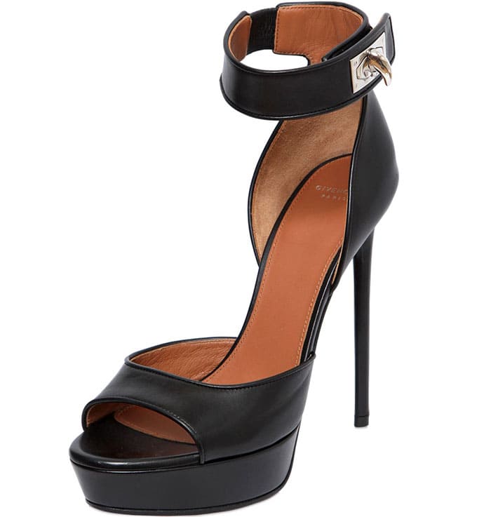 A studio-style view highlights the Clara sandal’s barely-there construction, with slim leather bands and a sculptural platform sole