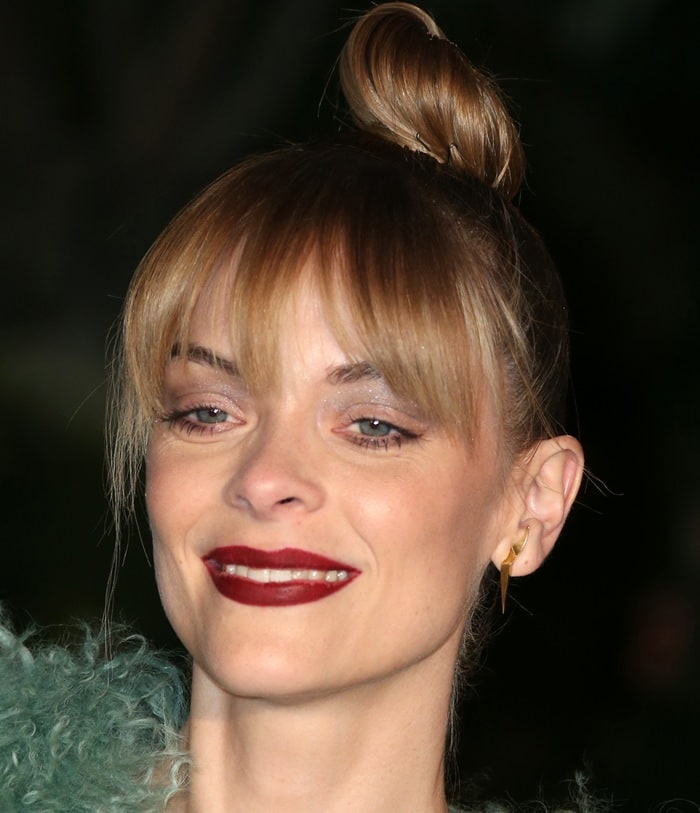 Jaime King pairs her topknot and wispy fringe with a bold berry lip at Burberry’s “London in Los Angeles” event held at Griffith Observatory in Los Angeles on April 16, 2015