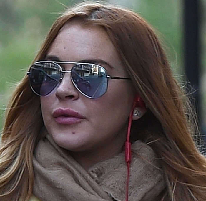 Lindsay Lohan with swollen lips and a bad complexion