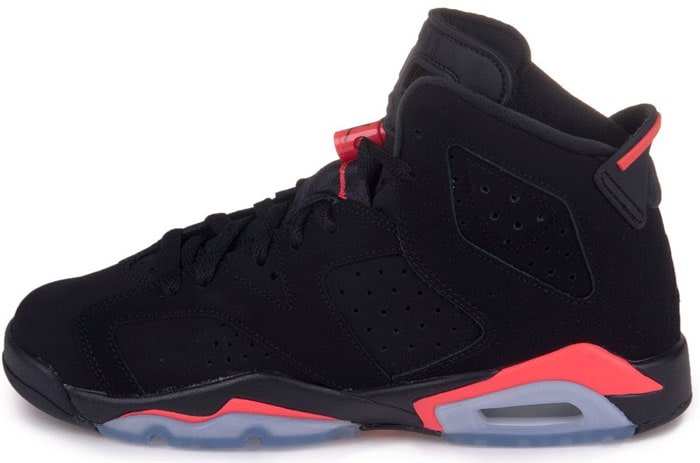 The Nike Boys Air Jordan 6 Retro BG "Infrared" Suede Basketball Shoes feature a sleek black upper accented with vibrant infrared detailing and an icy translucent sole, blending classic court heritage with modern streetwear appeal