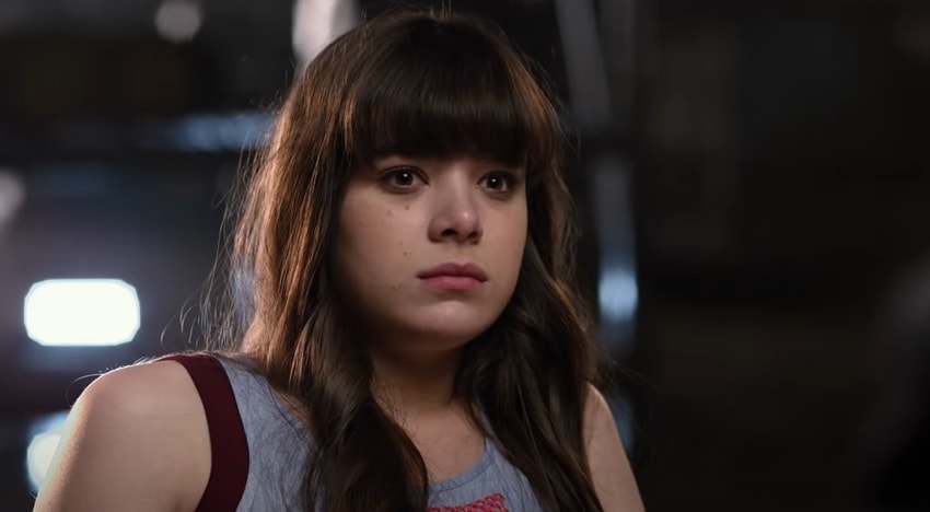 Hailee Steinfeld portrays the determined and vulnerable Megan Walsh in the action-comedy film Barely Lethal