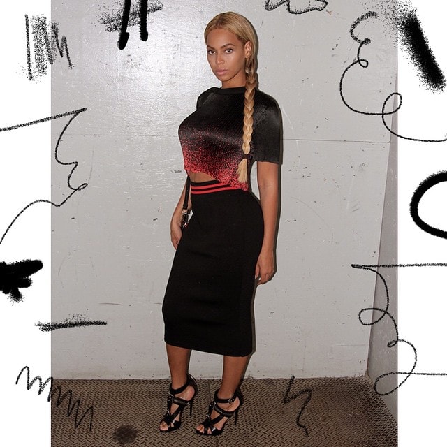 Beyonce sported a micro-pleated spray paint crop top from Alexander Wang paired with a black pencil skirt with a red waistband