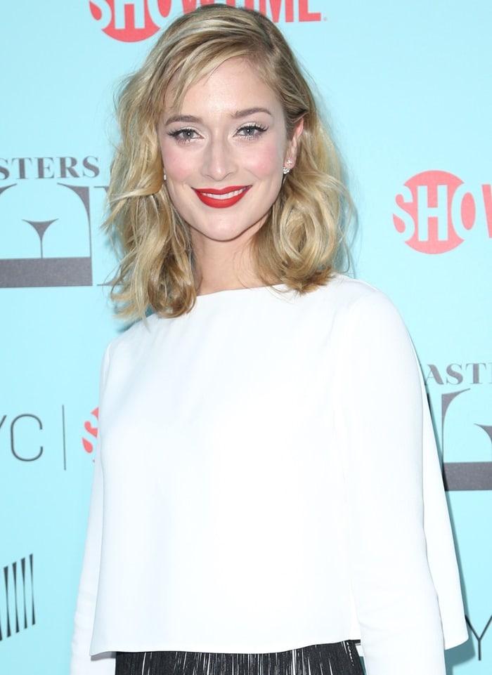 Caitlin Fitzgerald dazzled at the season three screening of Masters of Sex with her effortlessly chic wavy blonde hairstyle and bold red lipstick