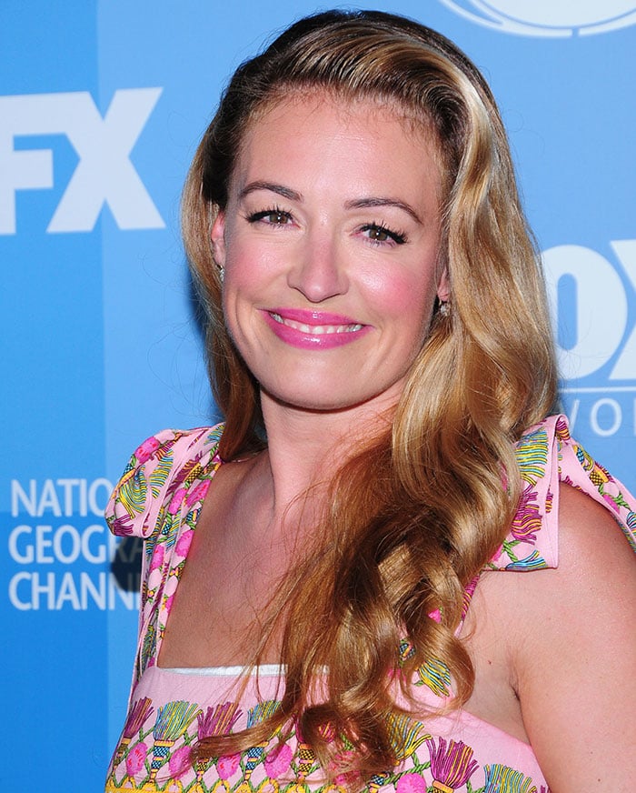 Cat Deeley's long blonde tresses in a soft retro-styled side parting