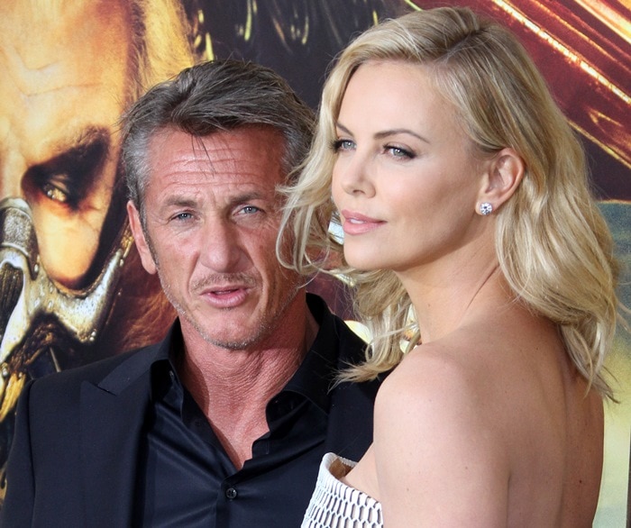 Charlize Theron, posing with her boyfriend Sean Penn, was a blonde bombshell at the premiere of her new movie Mad Max: Fury Road held at TCL Chinese Theatre in Hollywood on May 7, 2015
