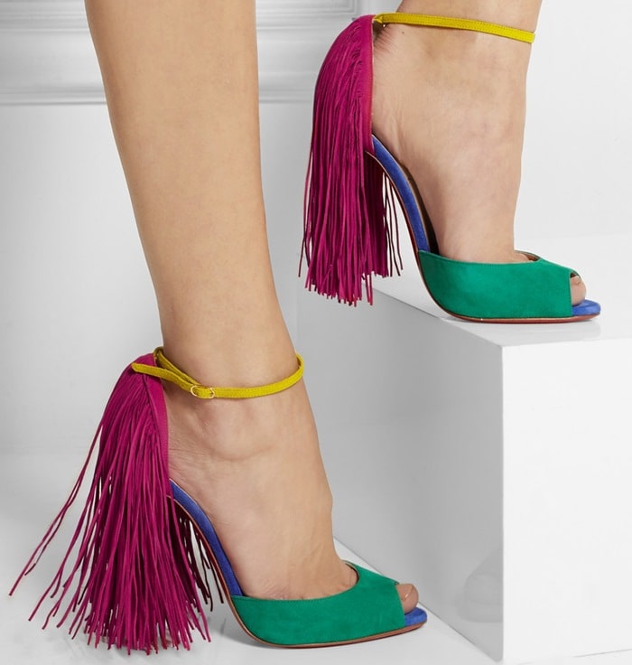 Christian Louboutin's Otrot sandals transformed a classic ankle-strap silhouette with vivid color-block suede panels and cascading fringe heels