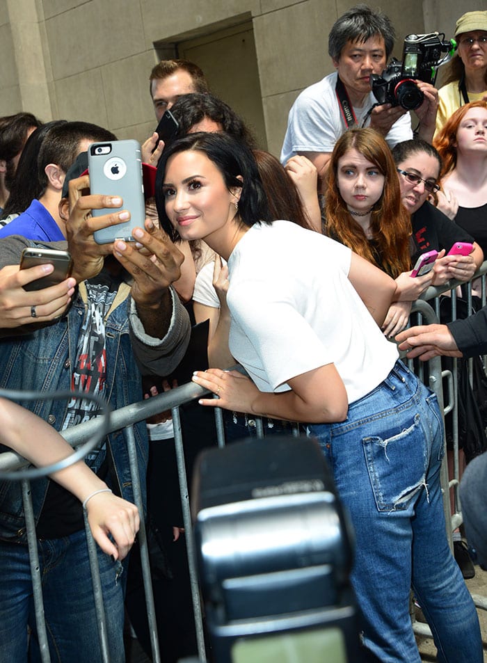 Demi Lovato promoting the "Be Vocal" campaign at The Huffington Post