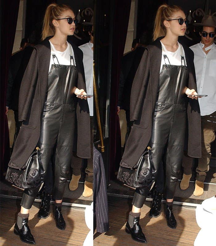 Gigi Hadid was spotted in Paris on March 8, 2015, wearing Fendi Iridia 0040/S sunglasses, a G-Star Raw Type C leather salopette, Whistles Riley pointed loafers, and a Rag Bone Perfect Muscle Tee