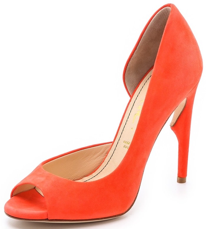 Jerome C. Rousseau's "Bryant" pump combined a classic peep-toe profile with an architectural cutout heel, a design detail that became one of the label's most recognizable signatures