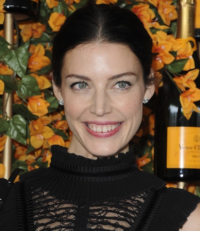 Jessica Paré radiates confidence with her tooth gap smile at the 2018 Veuve Clicquot Polo Classic