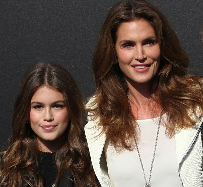 Kaia Gerber and Cindy Crawford showcase their striking resemblance while both sporting effortlessly chic styles at the Tomorrowland premiere