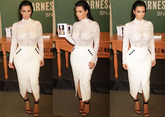 Kim Kardashian poses with her book Selfish at the Barnes Noble signing, showcasing her Dior Spring 2015 outfit and Céline “Mulese” sandals