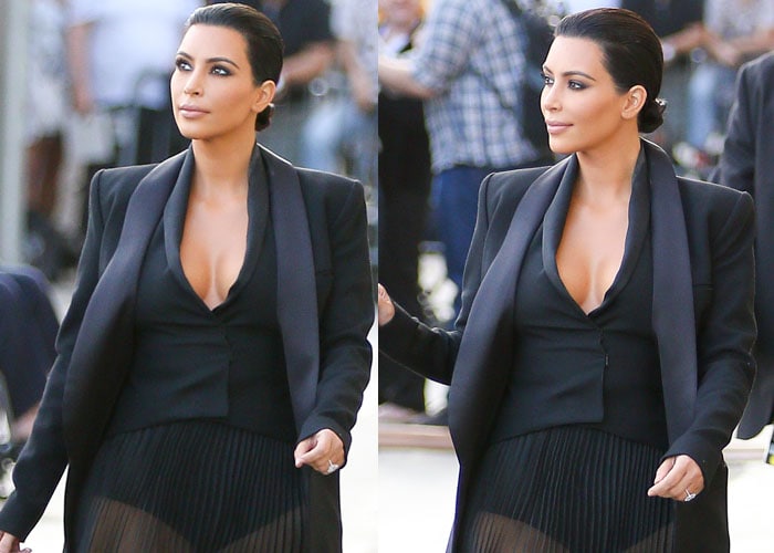 Kim Kardashian's cleavage-baring vest paired with a satin lapel blazer from the Balmain Spring 2015 collection