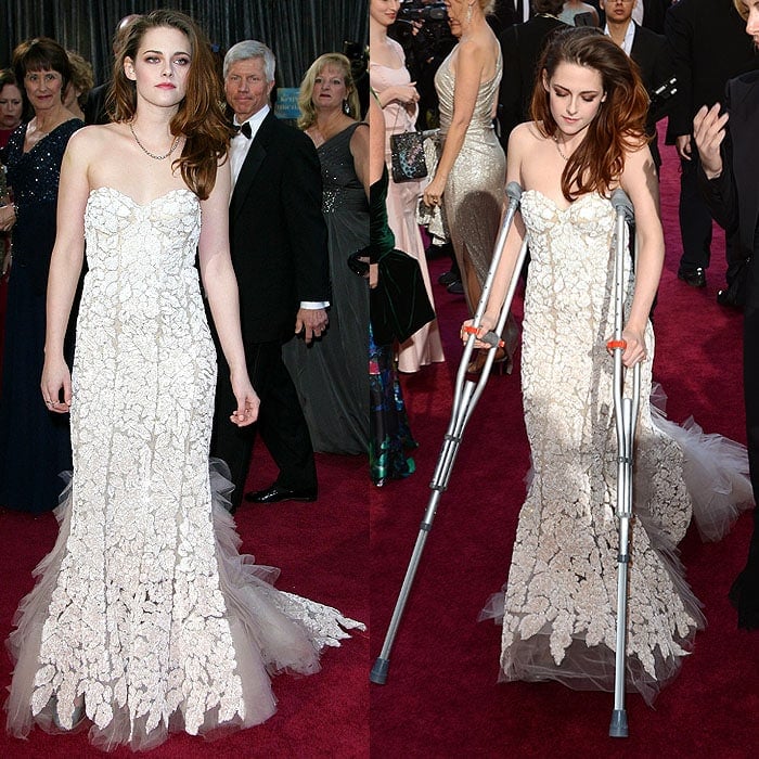 Kristen Stewart turned an Oscars obstacle into a statement, pairing her Reem Acra couture gown with ballet flats while confidently navigating the red carpet on crutches