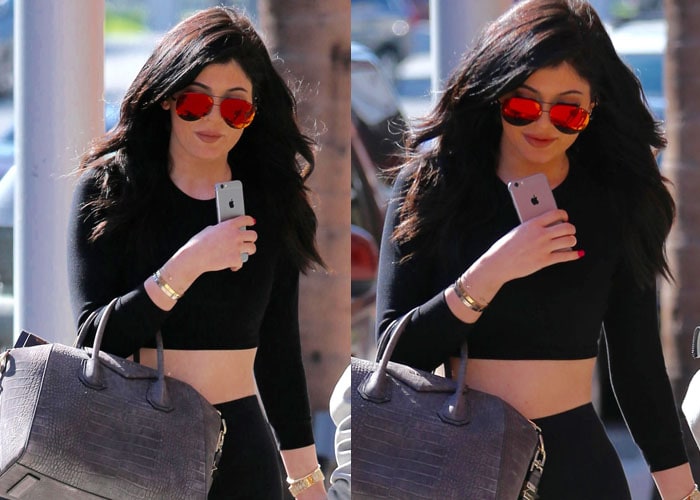 Channeling effortless off-duty chic, Kylie pairs her minimalist American Apparel separates with mirrored Victoria Beckham shades and a structured Givenchy Antigona duffel, blending athletic edge with luxury polish