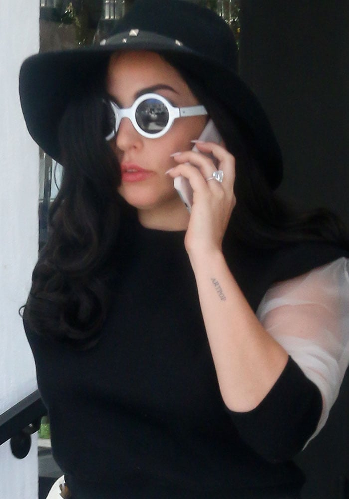 Lady Gaga shows off her huge engagement ring at Fig Olive restaurant in Beverly Hills on May 1, 2015