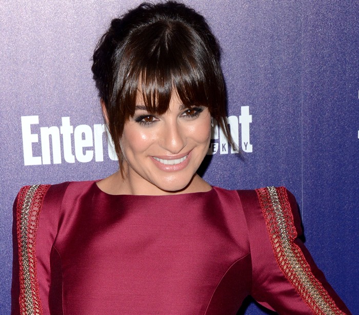 A closer look at Lea Michele’s beauty styling reveals her sleek blunt bangs, smoky eye makeup, and the intricate sleeve detailing of her Zuhair Murad mini dress