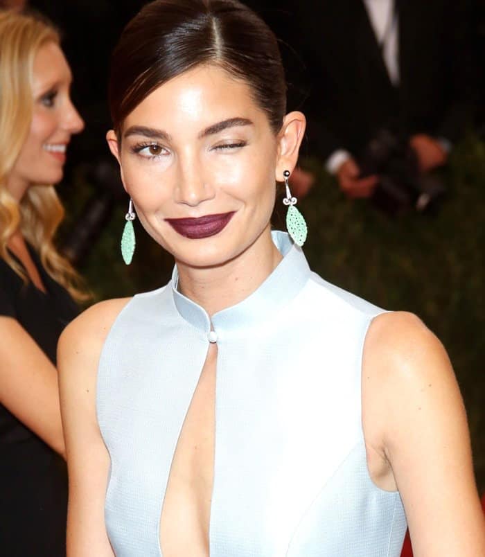Carolina Herrera's textured silver gown and dark lipstick were chosen by Lily Aldridge to make a dramatic statement
