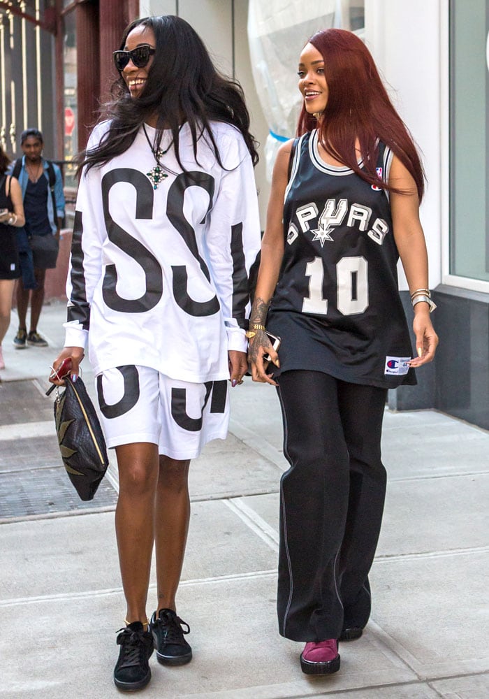 BFFs Rihanna and Melissa Forde twinning in sporty street-style outfits while shopping in NYC's SoHo neighborhood