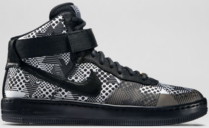 Nike Air Force 1 Ultra Force Mid “BHM” women’s sneakers in a black-and-white graphic print with a mid-top silhouette, signature Swoosh logo, and Velcro ankle strap