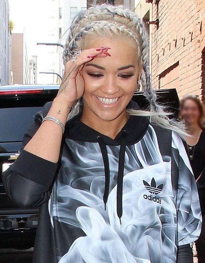 Rita Ora rocks blonde-and-gray cornrow braids that match her new collaboration with footwear brand adidas