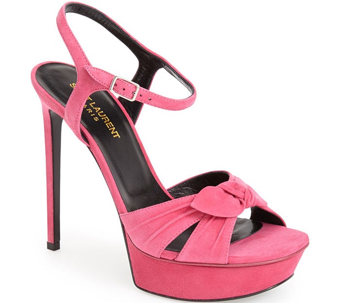 Rendered in vibrant pink suede, the Bianca sandal amplifies its retro glamour with saturated color and the same dramatic sky-high silhouette