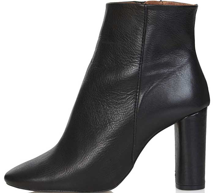 Crafted in smooth black leather, Topshop’s “Magnum” ankle boots feature a sleek almond toe and a sturdy wrapped block heel—delivering clean lines, subtle height, and everyday polish that grounds both casual and dressed-up looks