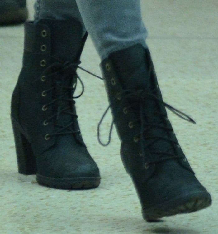 Close-up of the black Timberland Earthkeepers “Glancy” boots reveals their lace-up front, sturdy block heel, and rugged-yet-refined silhouette