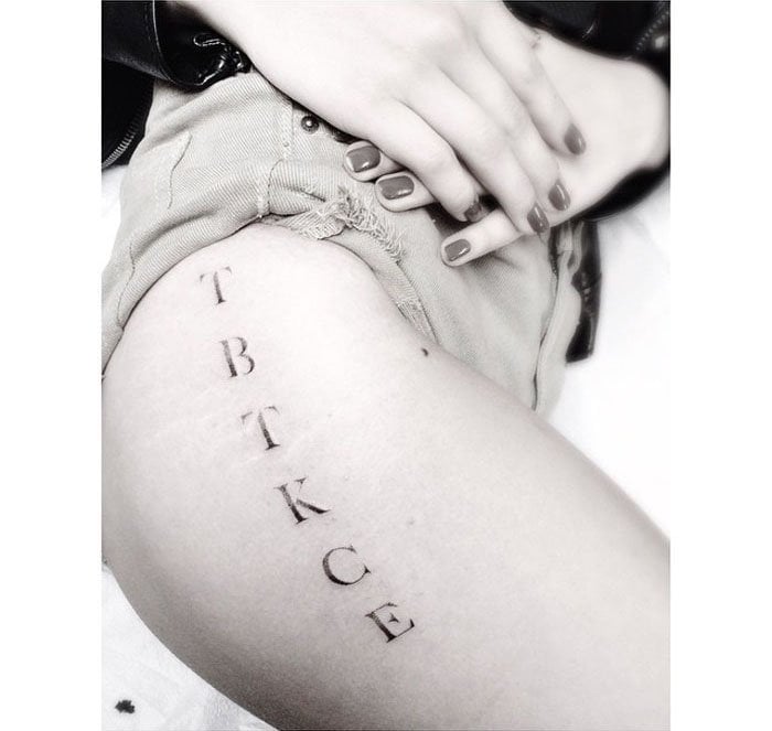 Chloë Grace Moretz's TBTKCE upper thigh tattoo by Dr. Woo