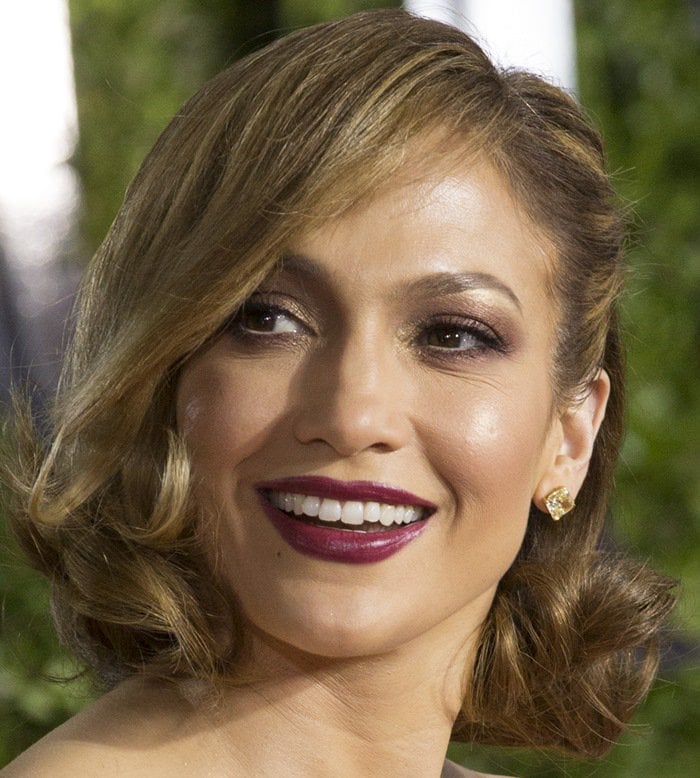 Jennifer Lopez accessorized with Harry Winston jewelry
