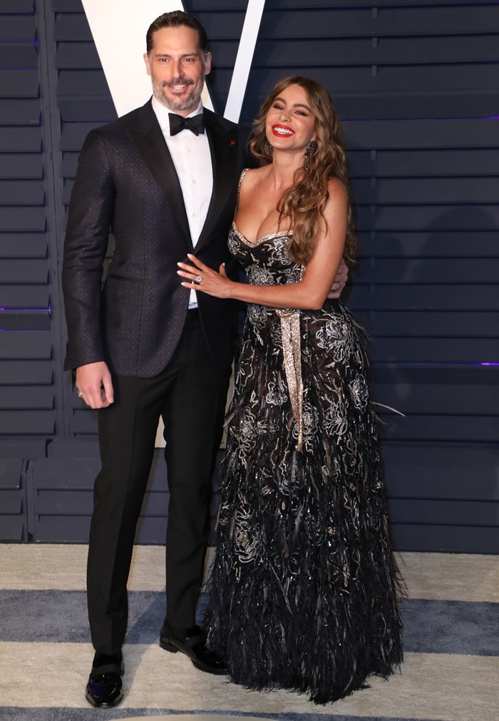 Sofia Vergara dazzled in an embellished black Dolce Gabbana gown with Lorraine Schwartz jewelry, posing alongside Joe Manganiello at the 2019 Vanity Fair Oscar Party hosted by Radhika Jones in Beverly Hills on February 24, 2019