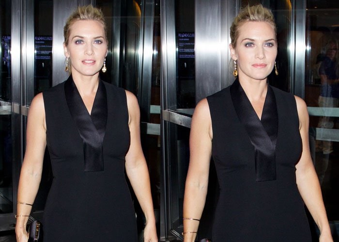 The actress shows off the sleek tailoring of her sleeveless black dress as she enters the venue
