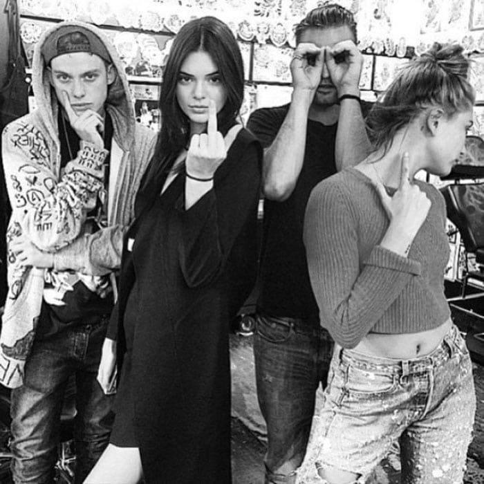 Kendall Jenner gets matching white dots with the boys of megachurch Hillsong NYC despite protests of big sister Kim