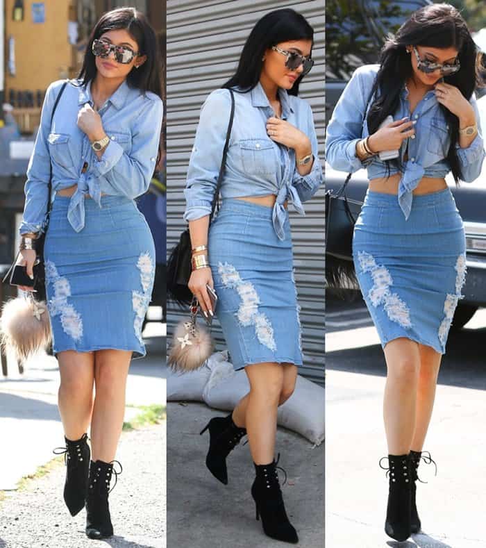 Kylie Jenner rocks a chic denim-on-denim look with a distressed pencil skirt and tied button-down shirt, accessorized with black lace-up booties and oversized sunglasses while shopping in West Hollywood