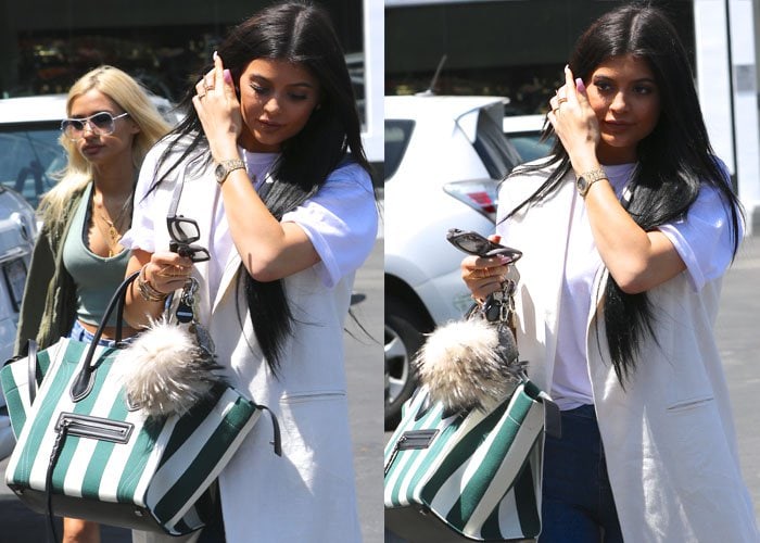 Kylie Jenner accessorized with some fun little trinkets