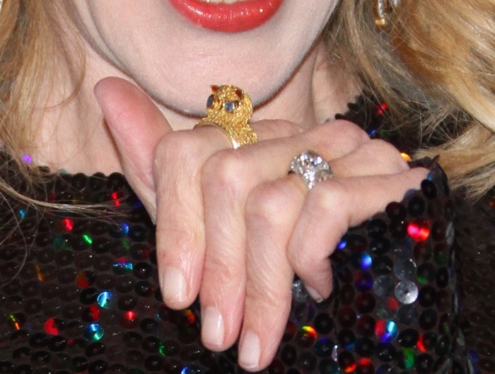 Nicole Kidman showing off her sequined dress and glittering rings