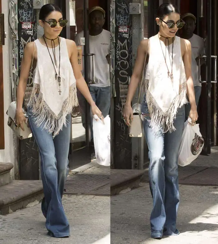 Vanessa Hudgens steps out in New York City wearing J Brand's Demi high-rise flare jeans, pairing them with a fringed tank top for a chic bohemian look