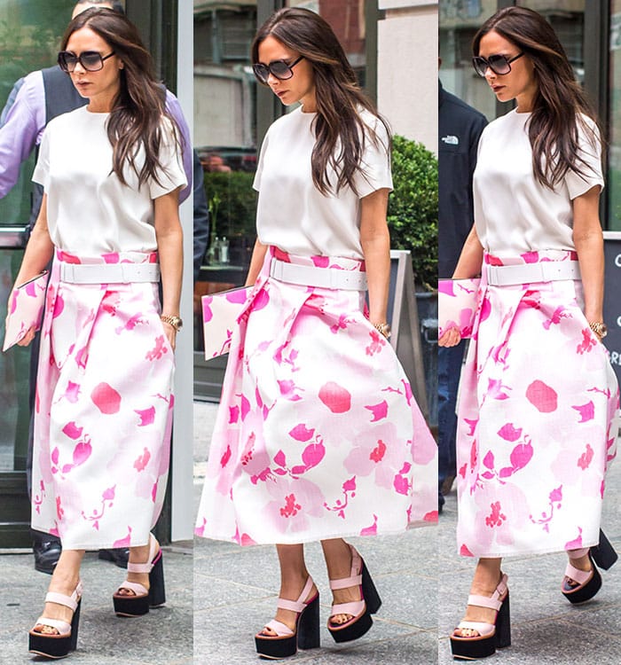Victoria Beckham in a floral skirt while leaving her hotel