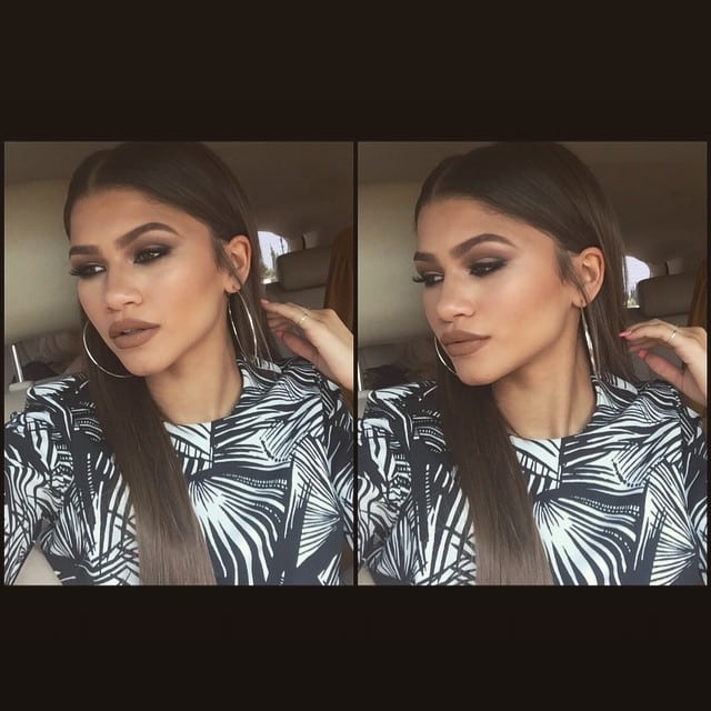 Zendaya captures her 'senior slay' moment in a car selfie, showcasing her polished makeup and bold palm-leaf print top on her way to high school graduation, as posted on Instagram on June 11, 2015