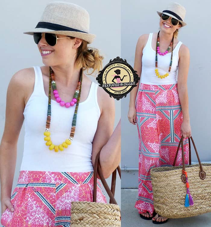 Abigail rocks colorful layered beaded necklaces with a simple white tank top with printed wide-legged pants