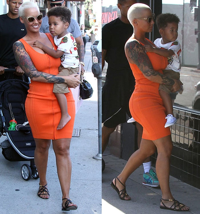 Amber Rose styled her look with a pair of Dolce Gabbana cat-eye sunglasses and flat sandals